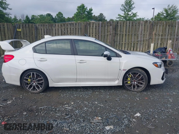 2021 Subaru WRX STI z VIN JF1VA2S69M9816079, wystawiony jako IAAI lot #42453417 z przebiegiem 19 481 mil mil oraz . Historia ofert i sprzedaży dostępna na DreamBid. Obrazek 14.