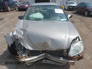2000 Honda Civic LX with VIN 1HGEJ6670YL030749, listed as a IAAI auction lot 42112694 with 153,903 mi miles. Bid and sale history available at carsss.com. Image 6.