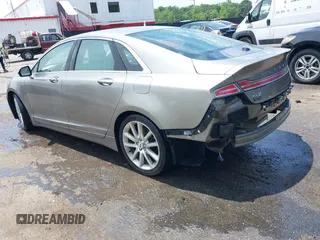 2016 Lincoln MKZ z VIN 3LN6L2J97GR617086, wystawiony jako IAAI lot #42446924 z przebiegiem 107 591 mil mil oraz . Historia ofert i sprzedaży dostępna na DreamBid. Obrazek 3.