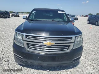 2015 Chevrolet Tahoe LTZ with VIN 1GNSCCKC9FR215932, listed as a Copart auction lot 52707765 with 232,801 mi miles and Clean Title. Bid and sale history available at carsss.com. Image 5.
