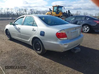 2004 Toyota Camry LE with VIN 4T1BE32K64U282875, listed as a IAAI auction lot 42038006 with 238,605 mi miles. Bid and sale history available at carsss.com. Image 3.