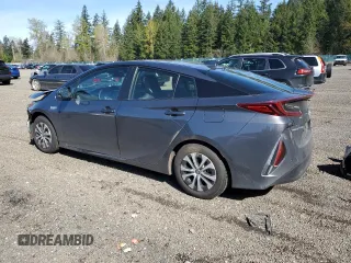 2021 Toyota Prius LE with VIN JTDKAMFP7M3185847, listed as a Copart auction lot 52897465 with 58,996 mi miles and Salvage Title. Bid and sale history available at DreamBid. Image 2.