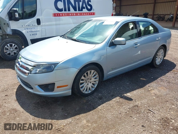 2011 Ford Fusion Hybrid with VIN 3FADP0L37BR264490, listed as a IAAI auction lot 42253495 with 112,866 mi miles and . Bid and sale history available at DreamBid. Image 2.