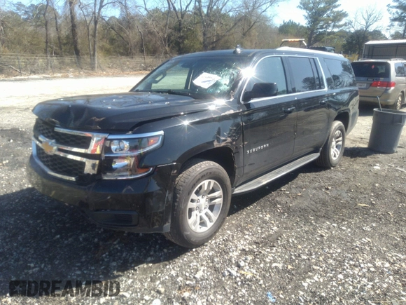 2019 Chevrolet Suburban LT with VIN 1GNSCHKCXKR405939, listed as a IAAI auction lot 41591475 with 106,554 mi miles and . Bid and sale history available at DreamBid. Image 18.