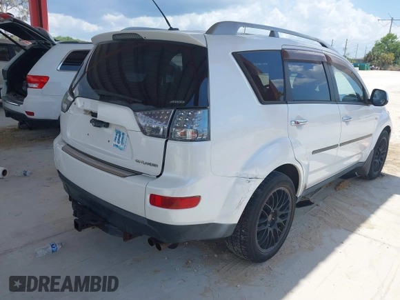 2007 Mitsubishi Outlander XLS z VIN JA4MT41X17Z009981, wystawiony jako IAAI lot #42198456 z przebiegiem 108 947 mil mil oraz . Historia ofert i sprzedaży dostępna na DreamBid. Obrazek 6.