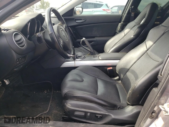 2005 Mazda RX-8 with VIN JM1FE173050145886, listed as a Copart auction lot 71110404 with 66,894 mi miles and Salvage Title. Bid and sale history available at carsss.com. Image 7.