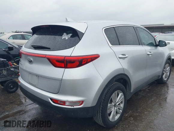 2018 Kia Sportage LX with VIN KNDPM3AC7J7337951, listed as a IAAI auction lot 41900482 with 105,857 mi miles and . Bid and sale history available at carsss.com. Image 4.