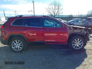 2014 Jeep Cherokee Limited with VIN 1C4PJMDB7EW219458, listed as a IAAI auction lot 41007909 with Not Provided miles and . Bid and sale history available at DreamBid. Image 12.