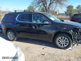 2019 Chevrolet Traverse LT Cloth with VIN 1GNEVGKW2KJ135213, listed as a IAAI auction lot 41293389 with 102,217 mi miles. Bid and sale history available at carsss.com. Image 14.