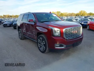2020 GMC Yukon Denali with VIN 1GKS2CKJ8LR170394, listed as a IAAI auction lot 40798809 with 81,611 mi miles. Bid and sale history available at carsss.com. Image 1.