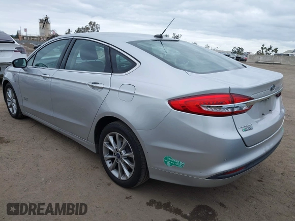 2017 Ford Fusion Energi SE with VIN 3FA6P0PU9HR354096, listed as a IAAI auction lot 42064703 with 69,601 mi miles. Bid and sale history available at carsss.com. Image 3.