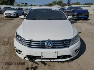 2014 Volkswagen CC R-Line with VIN WVWBN7AN2EE535855, listed as a Copart auction lot 75706934 with 148,889 mi miles and Salvage Title. Bid and sale history available at carsss.com. Image 5.
