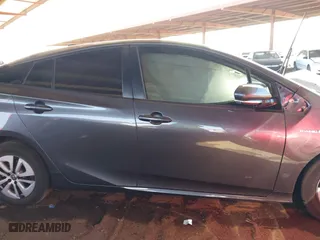 2018 Toyota Prius Two with VIN JTDKARFUXJ3062963, listed as a IAAI auction lot 41588989 with 114,842 mi miles. Bid and sale history available at carsss.com. Image 13.