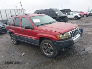 2004 Jeep Grand Cherokee Laredo with VIN 1J4GW48S94C151816, listed as a IAAI auction lot 41983332 with 151,227 mi miles. Bid and sale history available at carsss.com. Image 1.