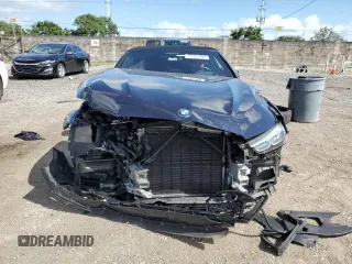 2019 BMW 8 Series M850i xDrive with VIN WBAFY4C55KBJ98774, listed as a Copart auction lot 77351894 with 0 mi miles and Non Repairable. Bid and sale history available at carsss.com. Image 5.