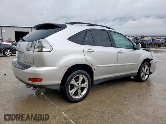 2006 Lexus RX 400h with VIN JTJGW31U762000555, listed as a Copart auction lot 54873185 with 191,579 mi miles and Salvage title. Bid and sale history available at DreamBid. Image 3.