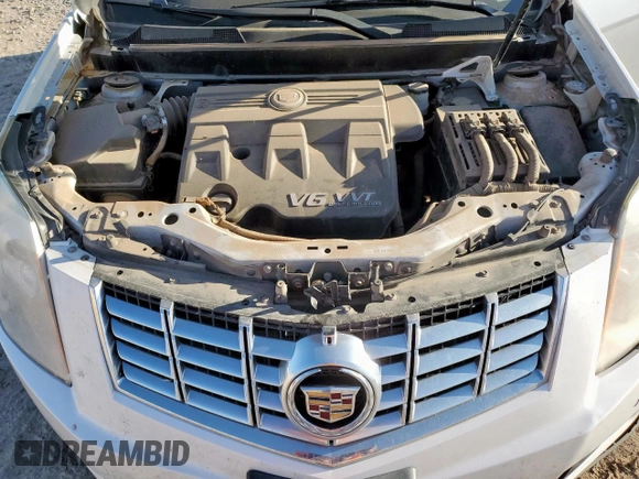 2016 Cadillac SRX Performance Collection with VIN 3GYFNCE37GS573748, listed as a Copart auction lot 66300135 with 136,619 mi miles and Salvage title. Bid and sale history available at DreamBid. Image 11.
