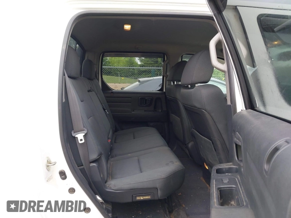 2014 Honda Ridgeline Sport z VIN 5FPYK1F70EB009711, wystawiony jako IAAI lot #42343485 z przebiegiem 154 317 mil mil oraz . Historia ofert i sprzedaży dostępna na DreamBid. Obrazek 8.
