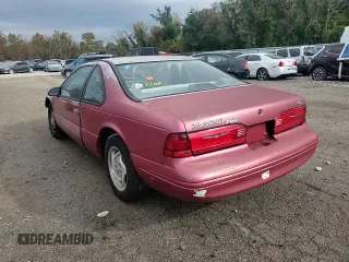 1996 Ford Thunderbird LX z VIN 1FALP62W7TH135632, wystawiony jako Copart lot #77134024 z przebiegiem 128 931 mil mil oraz Szkoda całkowita • Salvage title. Historia ofert i sprzedaży dostępna na DreamBid. Obrazek 11.