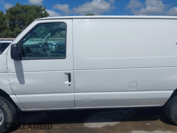 2011 Ford Econoline Cargo Commercial with VIN 1FTNE1EW6BDA58877, listed as a IAAI auction lot 40198855 with 179,416 mi miles and . Bid and sale history available at carsss.com. Image 14.