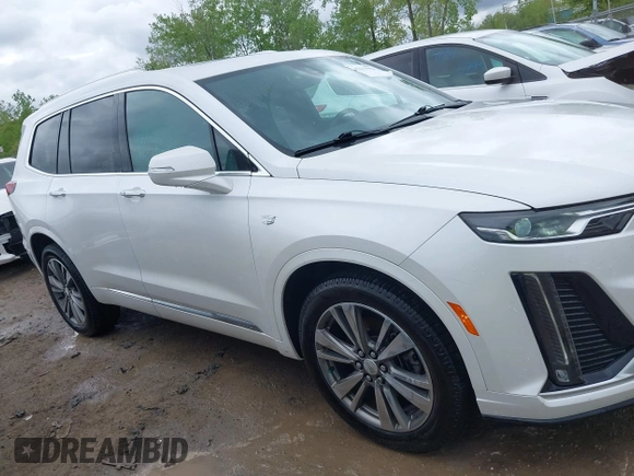 2021 Cadillac XT6 Premium Luxury z VIN 1GYKPDRS0MZ141453, wystawiony jako IAAI lot #42215954 z przebiegiem 144 245 mil mil oraz . Historia ofert i sprzedaży dostępna na DreamBid. Obrazek 14.