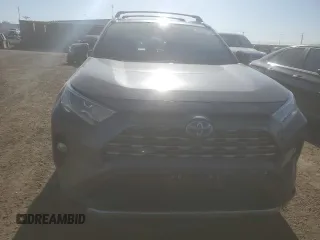 2021 Toyota RAV4 Hybrid XSE z VIN 4T3E6RFV9MU041188, wystawiony jako Copart lot #52697145 z przebiegiem 95 115 mil mil oraz Szkoda całkowita • Salvage title. Historia ofert i sprzedaży dostępna na DreamBid. Obrazek 5.
