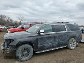 2017 Chevrolet Suburban Premier with VIN 1GNSKJKCXHR403076, listed as a Copart auction lot 46606025 with 99,481 mi miles and Salvage Title. Bid and sale history available at DreamBid. Image 1.