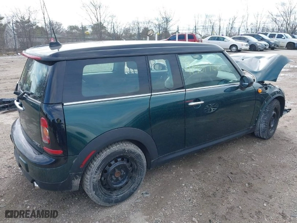 2010 MINI Cooper Clubman with VIN WMWML3C57ATX51076, listed as a IAAI auction lot 41931760 with 80,970 mi miles. Bid and sale history available at carsss.com. Image 4.