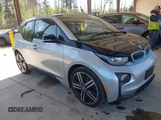 2015 BMW i3 z VIN WBY1Z4C5XFV279413, wystawiony jako IAAI lot #42164477 z przebiegiem 63 287 mil mil oraz . Historia ofert i sprzedaży dostępna na DreamBid. Obrazek 1.