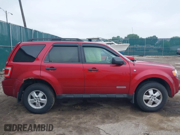 2008 Ford Escape XLT with VIN 1FMCU93138KD90369, listed as a IAAI auction lot 42430073 with Not provided miles and . Bid and sale history available at DreamBid. Image 13.