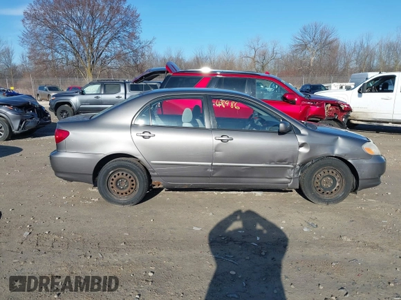 2004 Toyota Corolla CE with VIN 1NXBR38EX4Z265969, listed as a IAAI auction lot 41948986 with 235,816 mi miles. Bid and sale history available at carsss.com. Image 13.