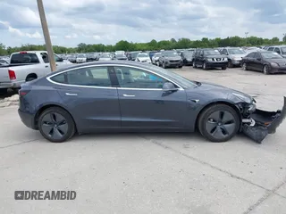 2018 Tesla Model 3 Long Range Battery with VIN 5YJ3E1EB3JF119498, listed as a IAAI auction lot 41966643 with 45,566 mi miles and . Bid and sale history available at DreamBid. Image 14.