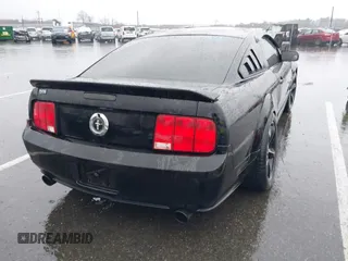 2007 Ford Mustang Deluxe with VIN 1ZVHT80N375320203, listed as a IAAI auction lot 41871055 with 80,891 mi miles. Bid and sale history available at carsss.com. Image 4.