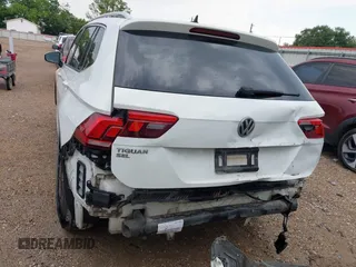 2019 Volkswagen Tiguan SE with VIN 3VV3B7AX6KM018161, listed as a IAAI auction lot 42279398 with 96,534 mi miles and . Bid and sale history available at DreamBid. Image 6.