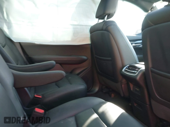 2022 Cadillac XT6 Premium Luxury with VIN 1GYKPCRS1NZ121711, listed as a IAAI auction lot 41149624 with 62,887 mi miles and . Bid and sale history available at DreamBid. Image 8.