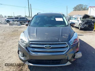 2018 Ford Escape Titanium with VIN 1FMCU0J99JUB09562, listed as a IAAI auction lot 41547659 with 63,700 mi miles and . Bid and sale history available at DreamBid. Image 12.