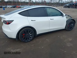 2021 Tesla Model Y Performance with VIN 5YJYGDEF1MF262930, listed as a IAAI auction lot 41606321 with 28,882 mi miles and . Bid and sale history available at DreamBid. Image 4.