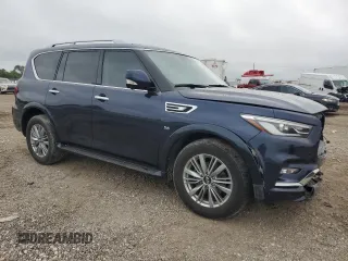 2020 Infiniti QX80 LUXE with VIN JN8AZ2NE2L9253853, listed as a Copart auction lot 70101594 with 76,337 mi miles and Salvage Title. Bid and sale history available at carsss.com. Image 4.