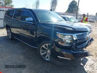 2019 Chevrolet Suburban LT with VIN 1GNSCJKC5KR360318, listed as a IAAI auction lot 41504344 with 82,997 mi miles. Bid and sale history available at carsss.com. Image 1.