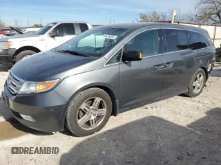 2012 Honda Odyssey Touring with VIN 5FNRL5H96CB122785, listed as a Copart auction lot 84459954 with 114,208 mi miles and Salvage Title. Bid and sale history available at carsss.com. Image 1.