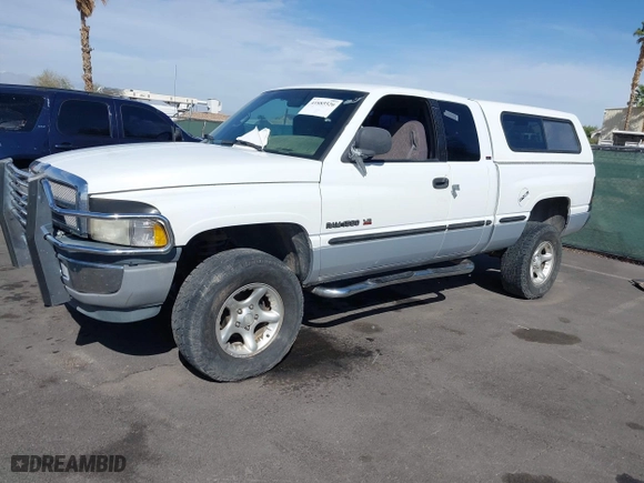 1999 Dodge Ram 1500 with VIN 1B7HF13ZXXJ600062, listed as a IAAI auction lot 41885520 with 217,643 mi miles. Bid and sale history available at carsss.com. Image 6.