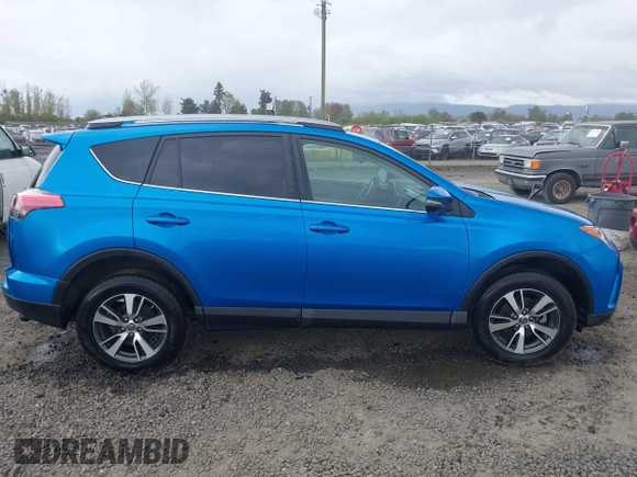 2018 Toyota RAV4 XLE with VIN 2T3RFREV0JW722354, listed as a IAAI auction lot 41974466 with 65,013 mi miles. Bid and sale history available at carsss.com. Image 14.