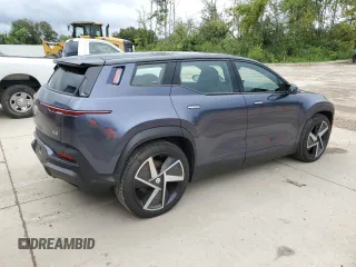 2023 Fisker Ocean One z VIN VCF1ZBU28PG005983, wystawiony jako Copart lot #69678514 z przebiegiem 4350 mil mil oraz Szkody całkowita. Historia ofert i sprzedaży dostępna na DreamBid. Obrazek 3.