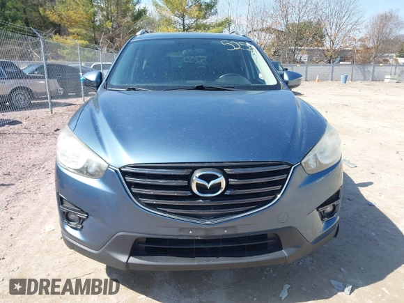 2016 Mazda CX-5 Grand Touring z VIN JM3KE4DY6G0785255, wystawiony jako IAAI lot #41887066 z przebiegiem 171 334 mil mil oraz . Historia ofert i sprzedaży dostępna na DreamBid. Obrazek 13.