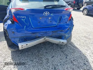 2019 Toyota C-HR XLE with VIN JTNKHMBX7K1015798, listed as a IAAI auction lot 39530918 with 77,958 mi miles. Bid and sale history available at carsss.com. Image 6.