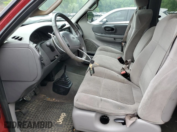 2002 Ford F-150 XL with VIN 1FTRX18L12NA76744, listed as a Copart auction lot 57335455 with Not provided miles and Clean title. Bid and sale history available at DreamBid. Image 7.