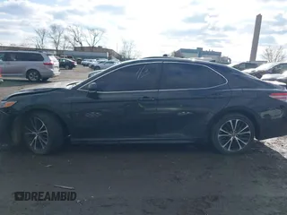 2018 Toyota Camry LE z VIN 4T1B11HK5JU649736, wystawiony jako IAAI lot #41536240 z przebiegiem 20 330 mil mil oraz . Historia ofert i sprzedaży dostępna na DreamBid. Obrazek 13.