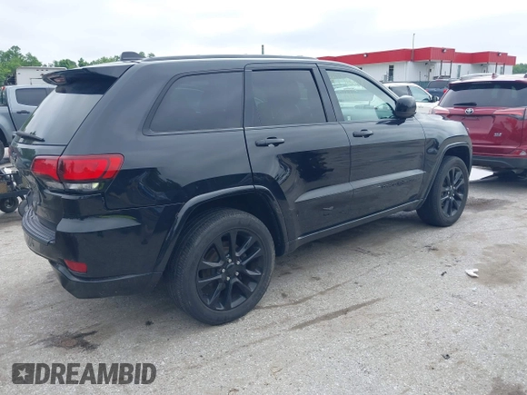 2020 Jeep Grand Cherokee Laredo E with VIN 1C4RJFAG9LC335473, listed as a IAAI auction lot 42366691 with 95,805 mi miles and . Bid and sale history available at DreamBid. Image 4.