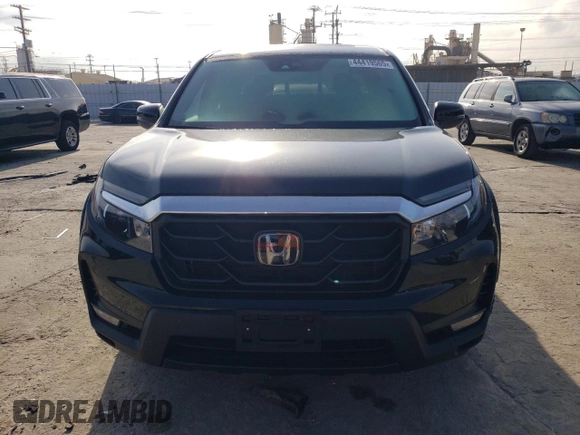2023 Honda Ridgeline RTL with VIN 5FPYK3F52PB023574, listed as a Copart auction lot 44419565 with 15,205 mi miles and Salvage title. Bid and sale history available at DreamBid. Image 5.