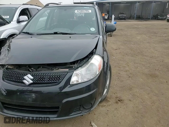 2012 Suzuki SX4 Crossover with VIN JS2YB5A36C6303133, listed as a Copart auction lot 42302295 with 120,711 mi miles and Salvage Title. Bid and sale history available at carsss.com. Image 10.